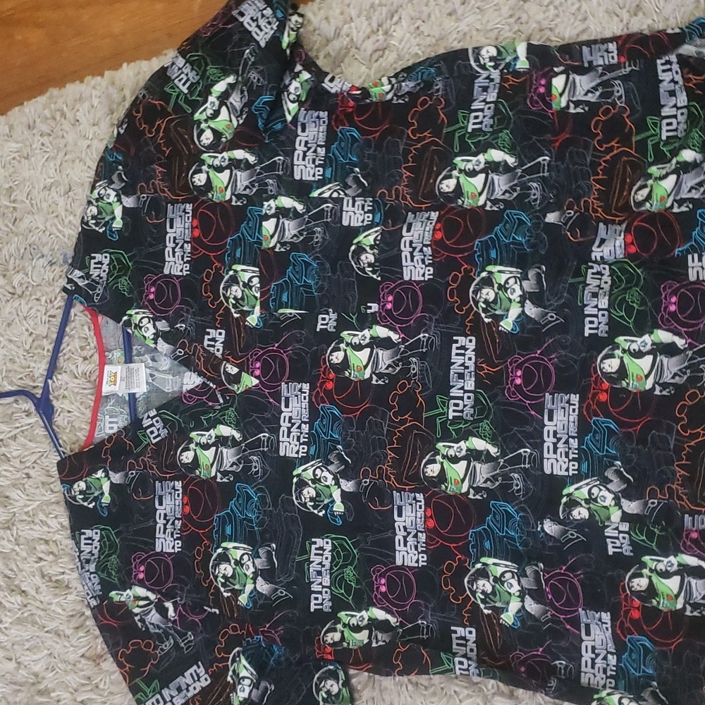 Never worn toy story scrub top